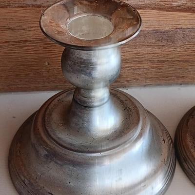 Two matching sets of candle holders - Gallery & Silverplated - and a pack of tapered candles