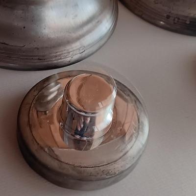 Two matching sets of candle holders - Gallery & Silverplated - and a pack of tapered candles