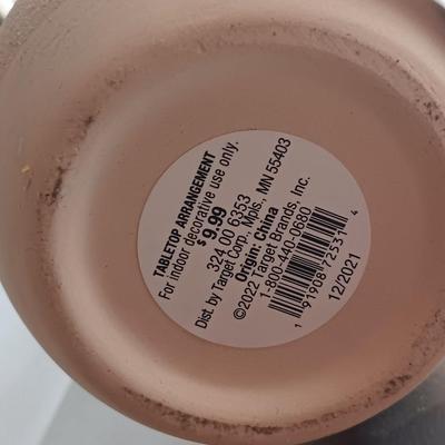 Free standing light-weight stainless decorative shelf with faux accent plant and paper organizer