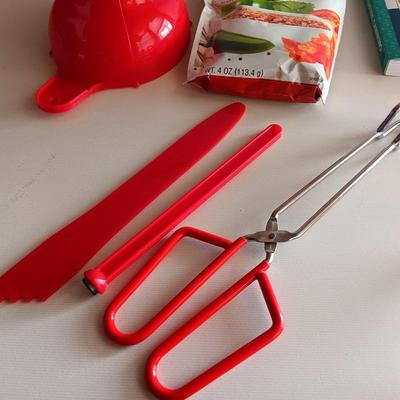 Complete Guide to Pressure canning book with canning supplies and utensils