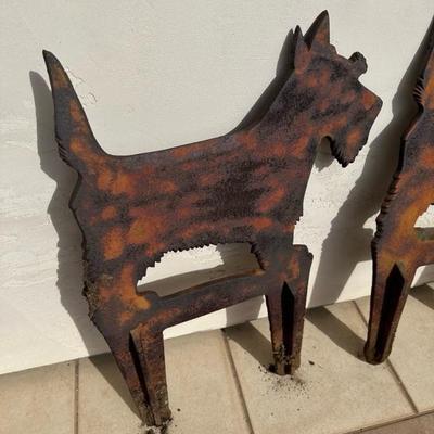 Lot 1069 two pieces of dog yard art 25 inches tall