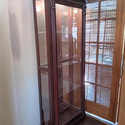 Pulaski Furniture 2 way sliding door curio cabinet.