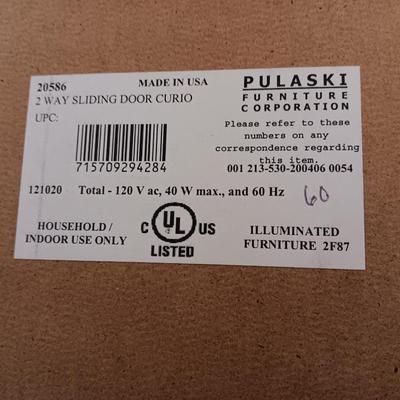 Pulaski Furniture 2 way sliding door curio cabinet.