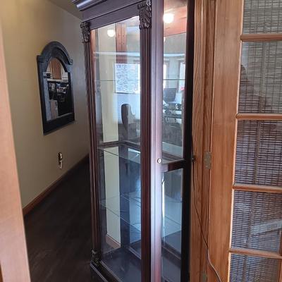 Pulaski Furniture 2 way sliding door curio cabinet.