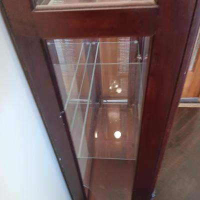 Pulaski Furniture 2 way sliding door curio cabinet.