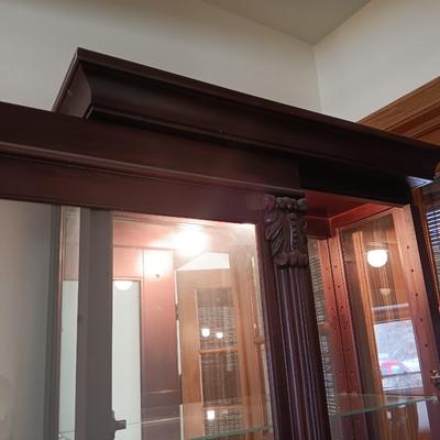 Pulaski Furniture 2 way sliding door curio cabinet.