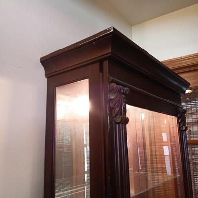 Pulaski Furniture 2 way sliding door curio cabinet.