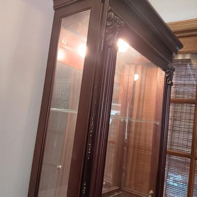 Pulaski Furniture 2 way sliding door curio cabinet.