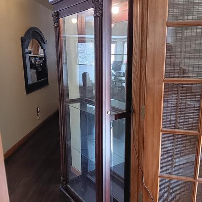 Pulaski Furniture 2 way sliding door curio cabinet.