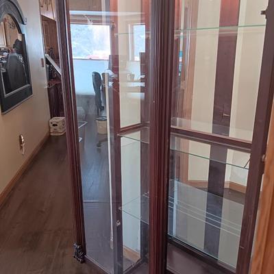 Pulaski Furniture 2 way sliding door curio cabinet.