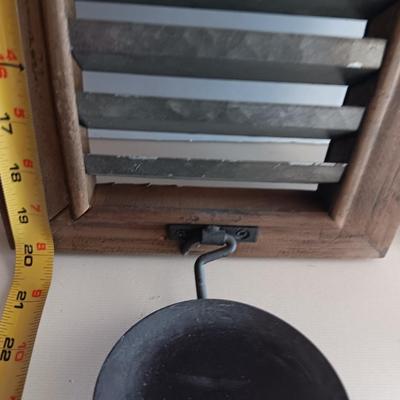 Three wood framed Metal accent candle wall sconces.