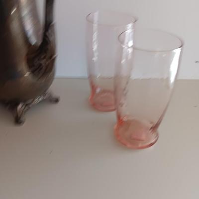 Silver plate Oneida pitcher with four pink toned drinking glasses