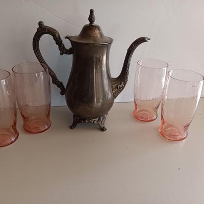 Silver plate Oneida pitcher with four pink toned drinking glasses