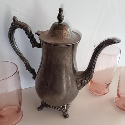 Silver plate Oneida pitcher with four pink toned drinking glasses