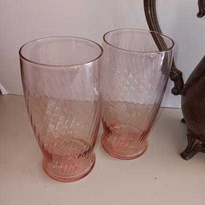 Silver plate Oneida pitcher with four pink toned drinking glasses