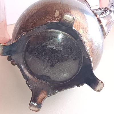 Silver plate Oneida pitcher with four pink toned drinking glasses