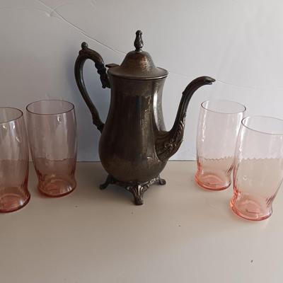 Silver plate Oneida pitcher with four pink toned drinking glasses