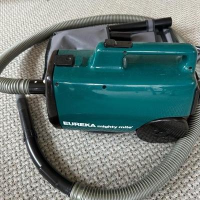 Lot 1081 Eureka mighty mite canister, vacuum and accessories