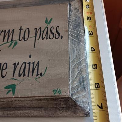 Metal Fleur De Lis accented dish with 4 large decorative balls and a sawdust city wood sign with saying.