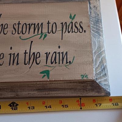 Metal Fleur De Lis accented dish with 4 large decorative balls and a sawdust city wood sign with saying.