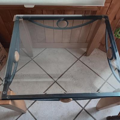 Metal framed - wooden accent - glass topped end table