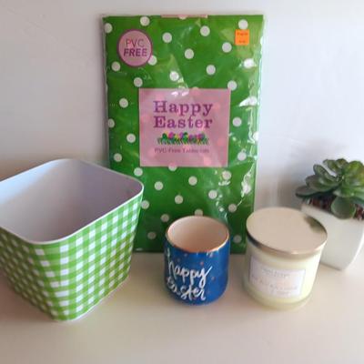 Happy Easter! Easter time decorations - table cloth - large bowl - happy Easter cup - candle and more