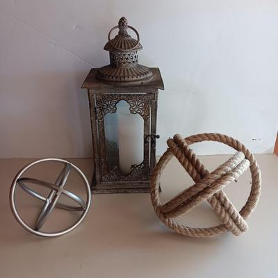 Decorative metal and rope Sphere with metal candle lantern -