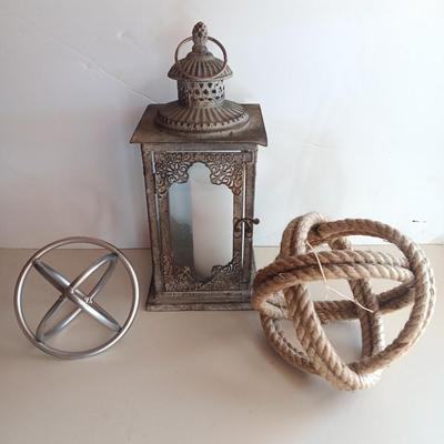 Decorative metal and rope Sphere with metal candle lantern -