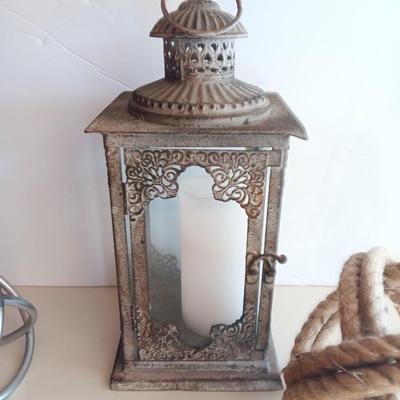 Decorative metal and rope Sphere with metal candle lantern -