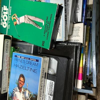 large collection of golf VHS tapes