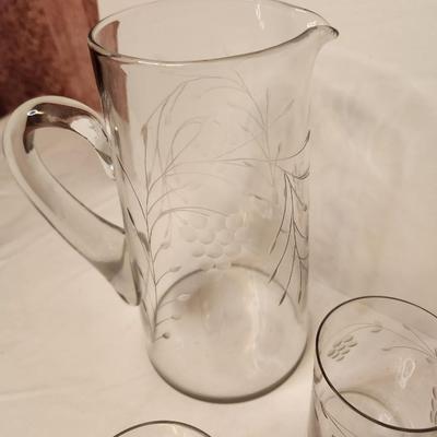 Lot #45 Vintage crystal pitcher with 8 matching glasses - grape motif
