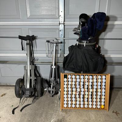 LOT 32G: Collection Of Golf Clubs, Push Carts & Golf Ball Display