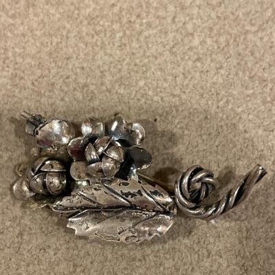 1 Smithsonian and handmade silver pins