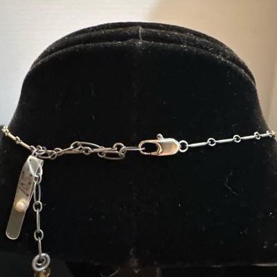 Lot 943 3 silver tone necklaces