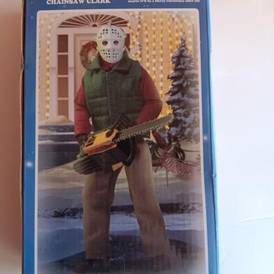 New in package - NECA Reel Toys National Lampoon's Christmas Vacation - Chainsaw Clark
