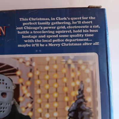 New in package - NECA Reel Toys National Lampoon's Christmas Vacation - Chainsaw Clark