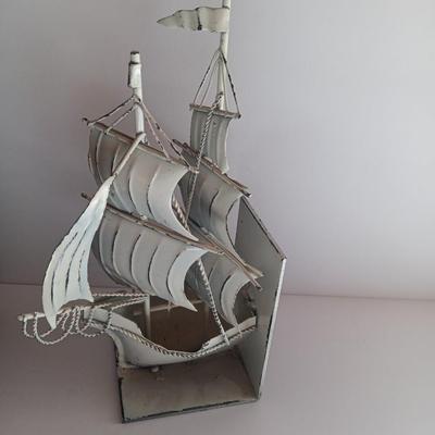 Nautical home decor - metal ship book ends with captains' wheel decor.