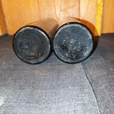 Pair ot glass storage bottles
