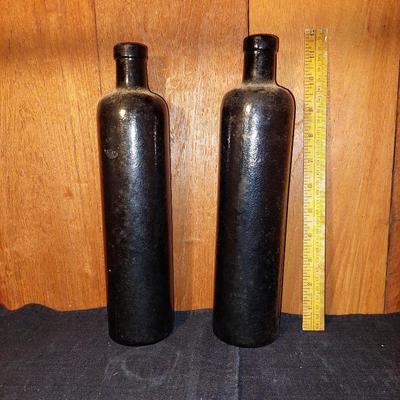 Pair ot glass storage bottles