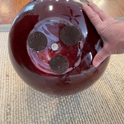 Large burgundy orb vase