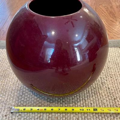 Large burgundy orb vase
