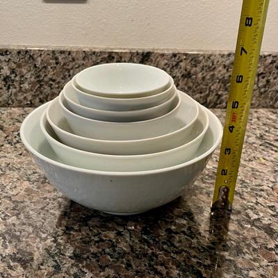 7 white nesting bowls