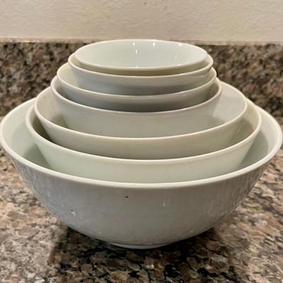 7 white nesting bowls