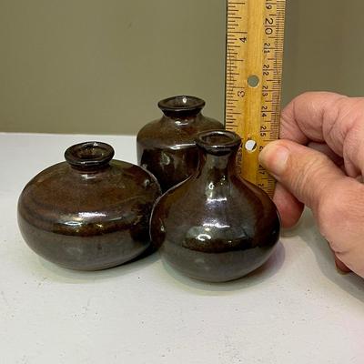 Small brown pottery vases