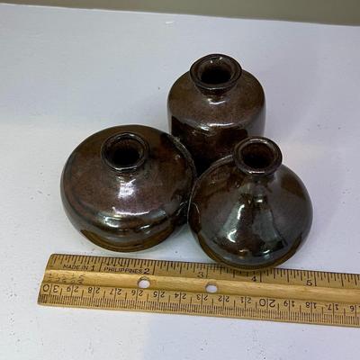 Small brown pottery vases