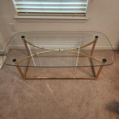 Glass top coffee table 49x24 x16