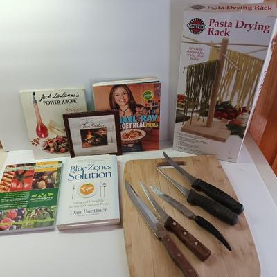 Cookbooks with NorPro Pasta drying rack - cutting board and a variety of knives