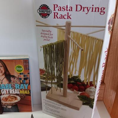 Cookbooks with NorPro Pasta drying rack - cutting board and a variety of knives