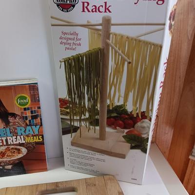 Cookbooks with NorPro Pasta drying rack - cutting board and a variety of knives
