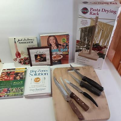 Cookbooks with NorPro Pasta drying rack - cutting board and a variety of knives